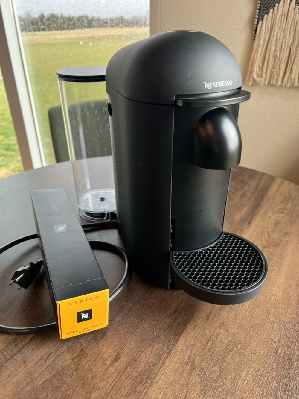 Nespresso Matte Black Vertuo Plus Deluxe Coffee and Espresso Maker with pods